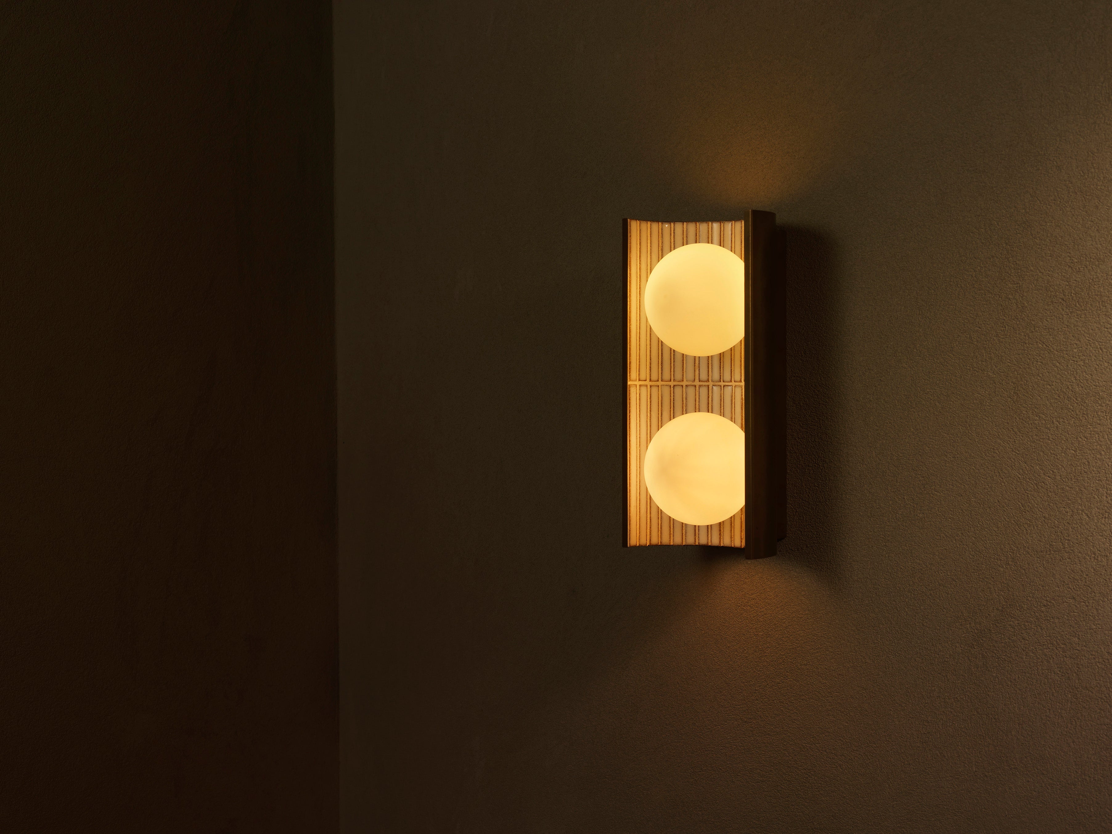 Handcrafted ceramic wall light by Transmitt. Mid-Century Inspired, Aged Brass. Made in Australia.