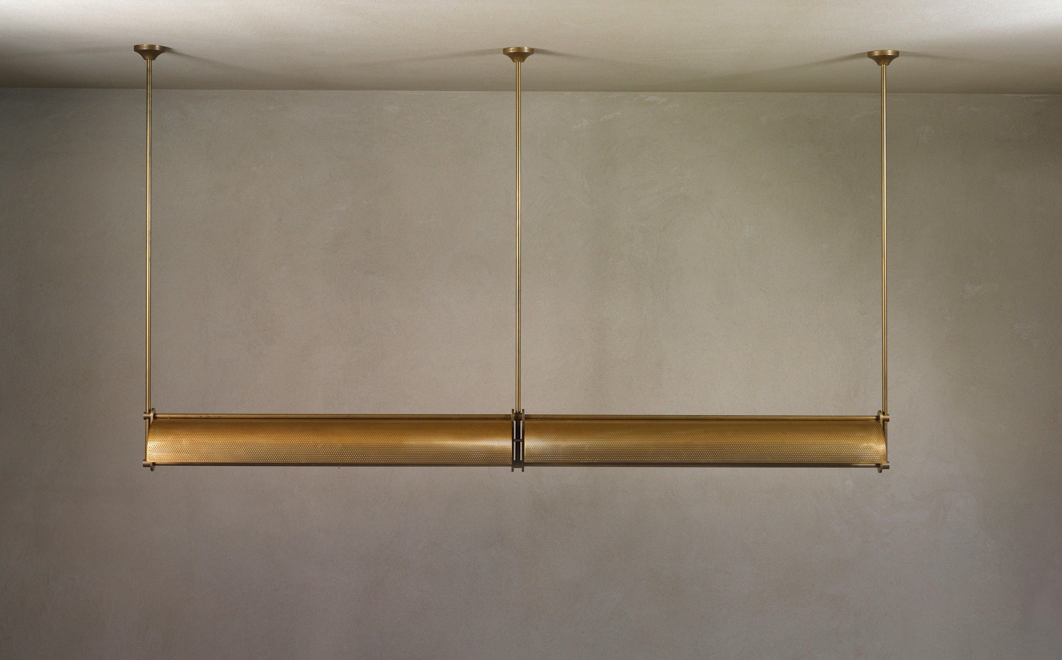 Hand crafted brass linear pendant by Transmitt. Made in Australia.