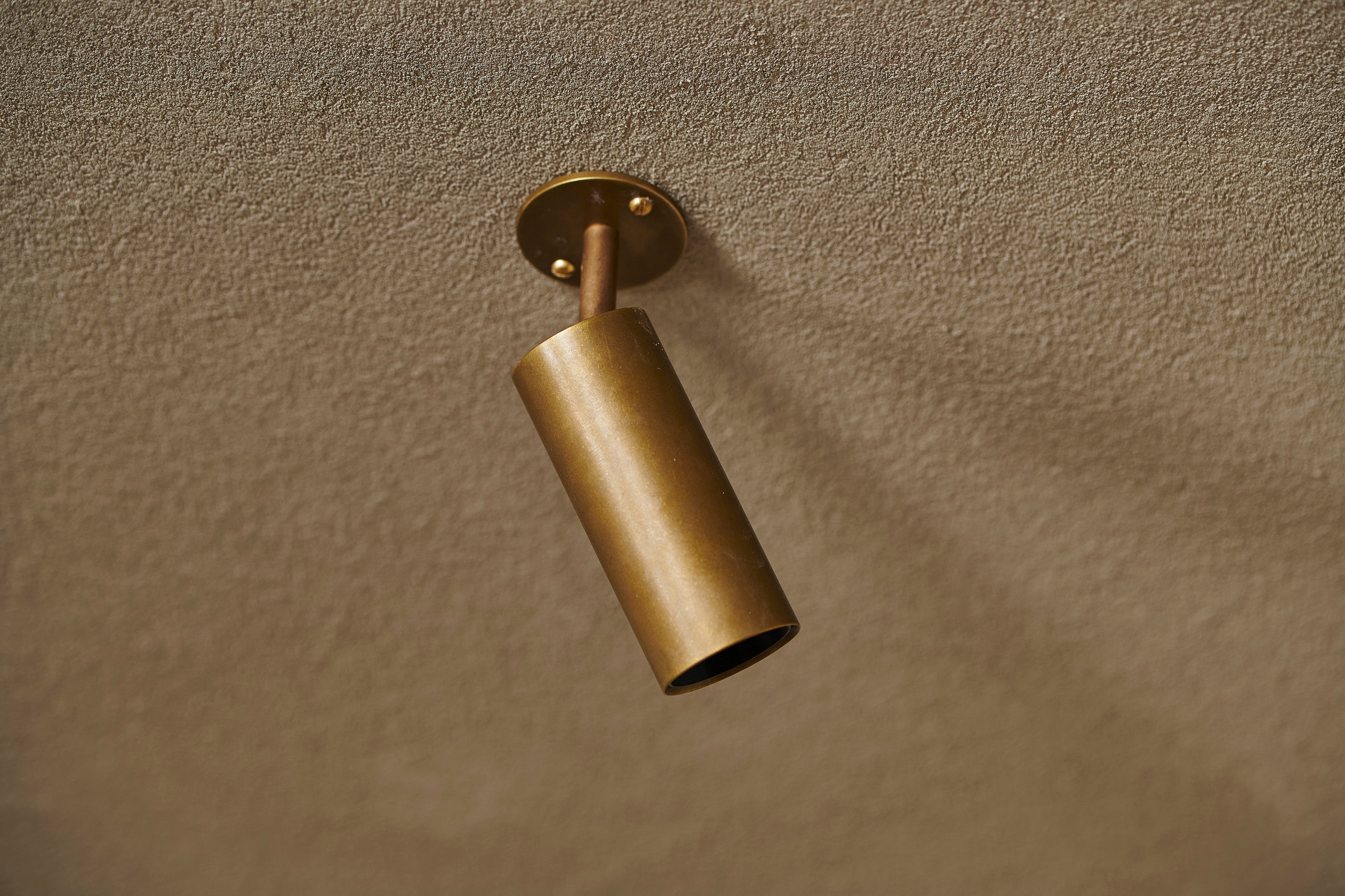 Handcrafted mini adjustable spot by Transmitt. Aged brass. Mid-Century Inspired. Made in Australia.