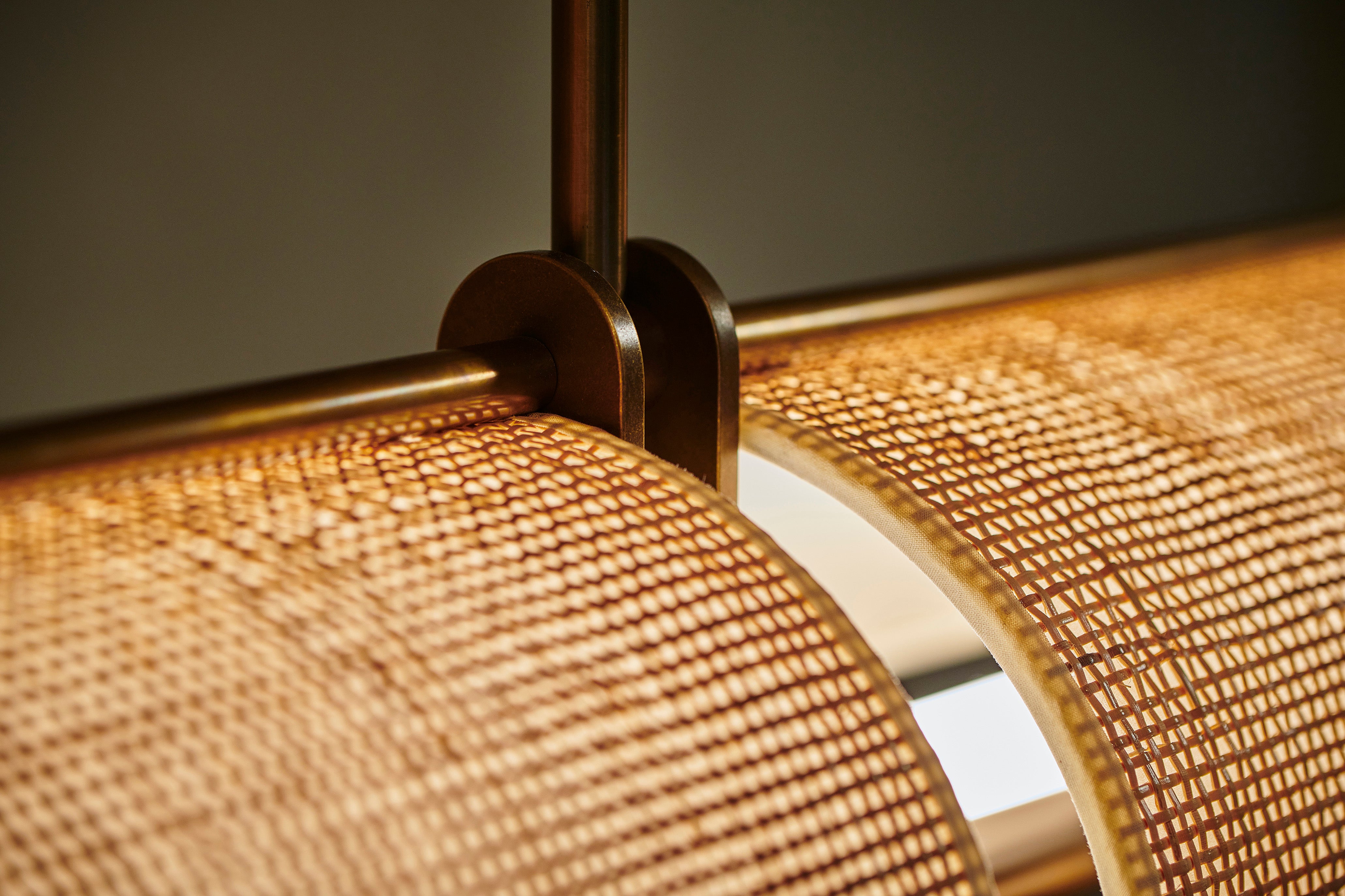 Handcrafted rattan linear pendant by Transmitt. Made in Australia.