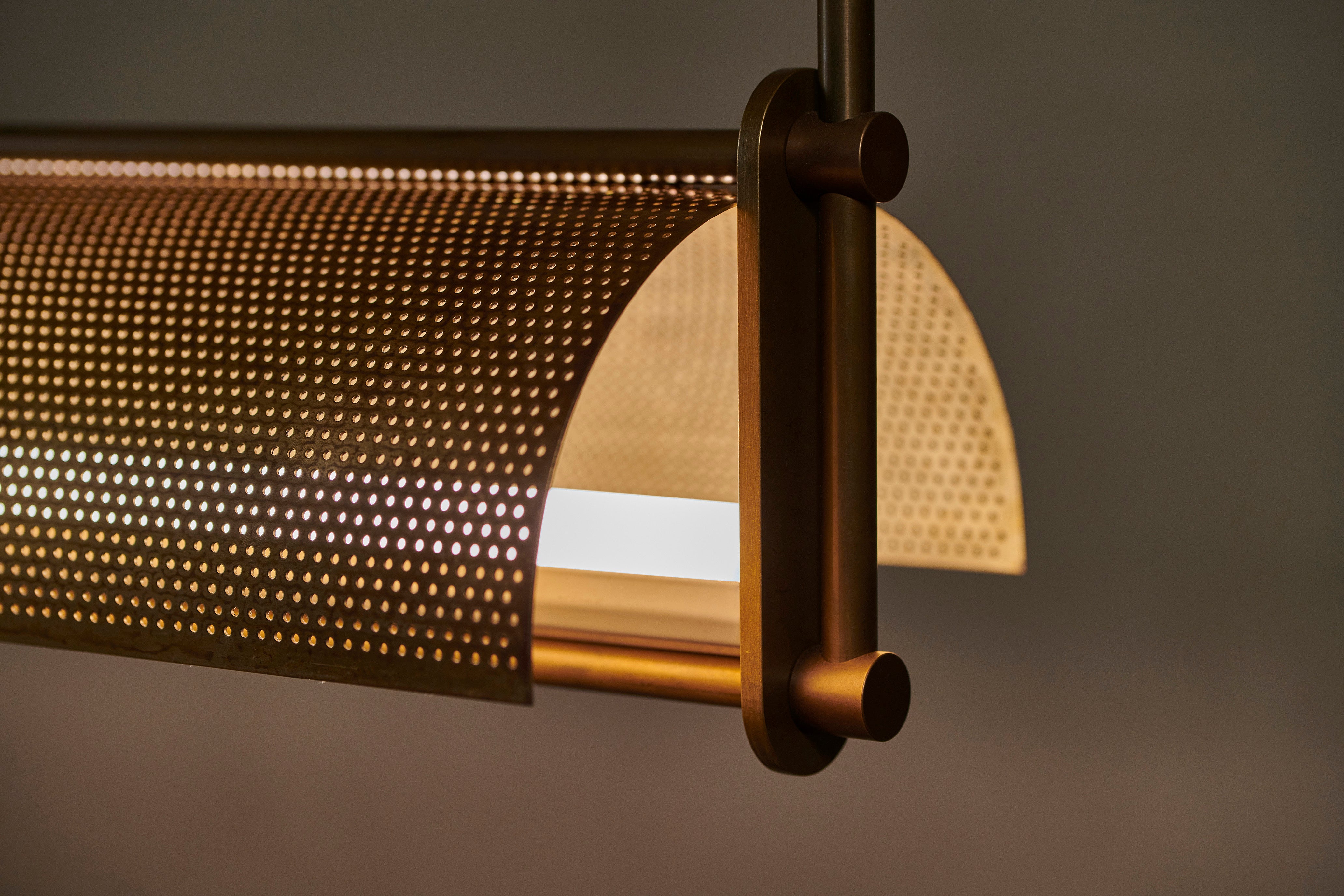 Handcrafted brass linear pendant by Transmitt. Made in Australia.