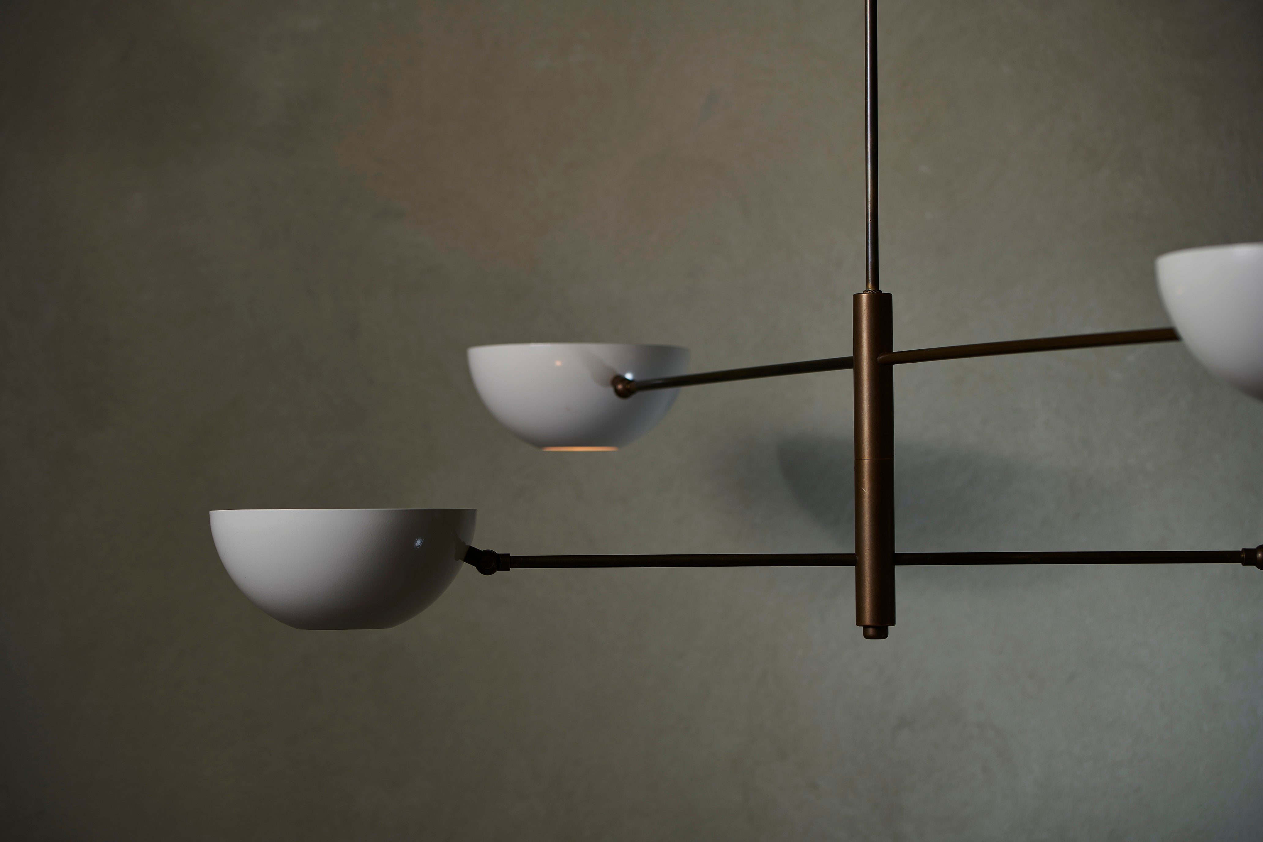 Handcrafted balance pendant by Transmitt. Mid-Century Inspired, Aged Brass. Made in Australia.